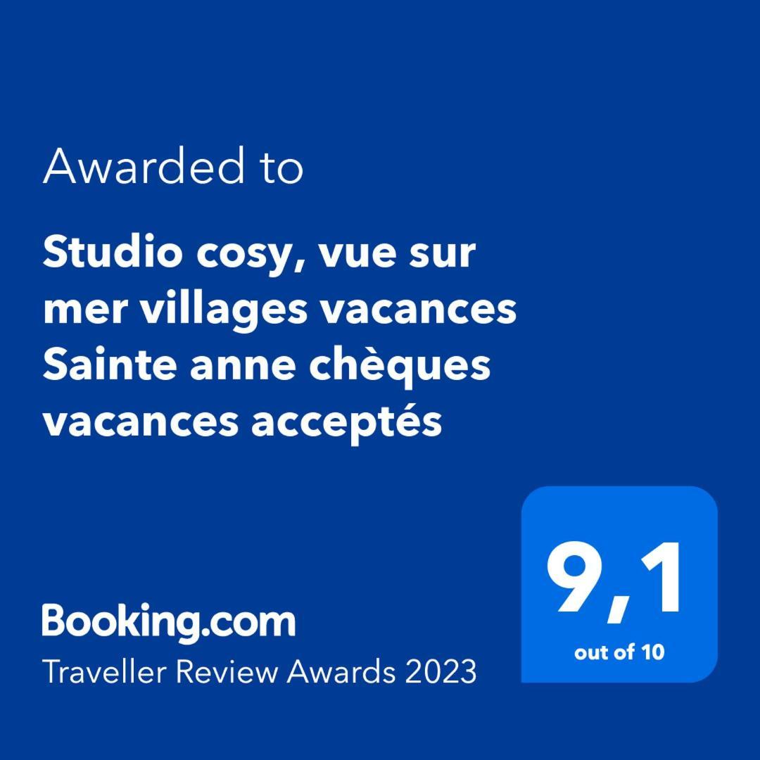 Studio cosy, vue sur mer villages vacances Sainte anne chèques vacances acceptés Chambre photo